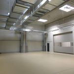 SF-Bau-Hallenausbau mit Bodenbeschichtung-Schnelllauftore-Schlüsselfertigbau